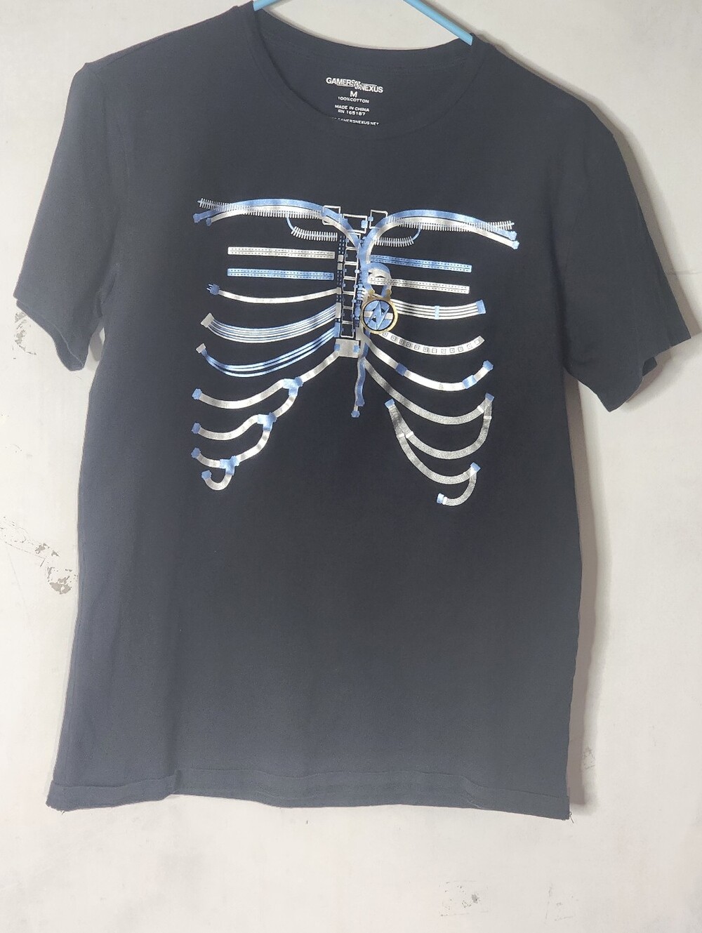 Gamers Nexus Kids Black Tee with Holographic Ribcage Graphic